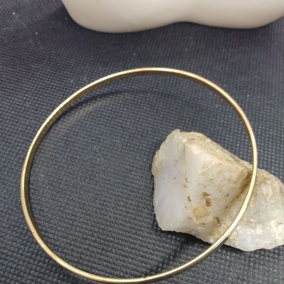 Gold‎ tone bangle